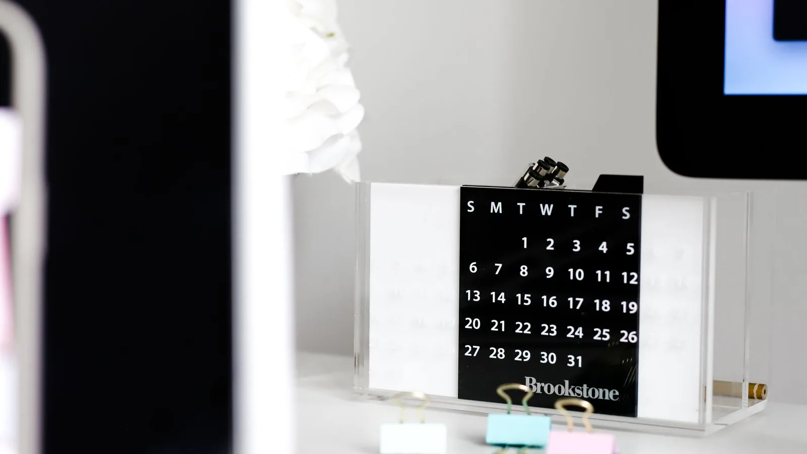 Office desk with a calendar and computer Office desk with a calendar and computer
