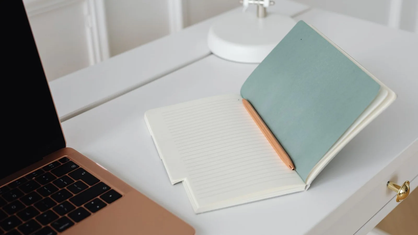 Notebook and pen in a quiet workspace