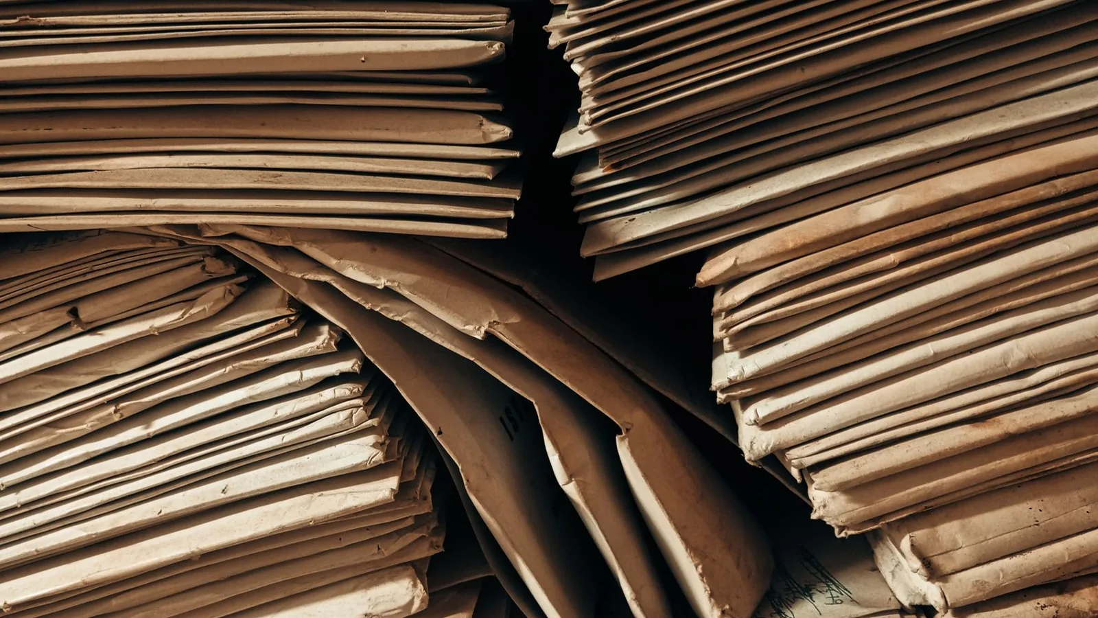 Stacks of brown paper envelopes